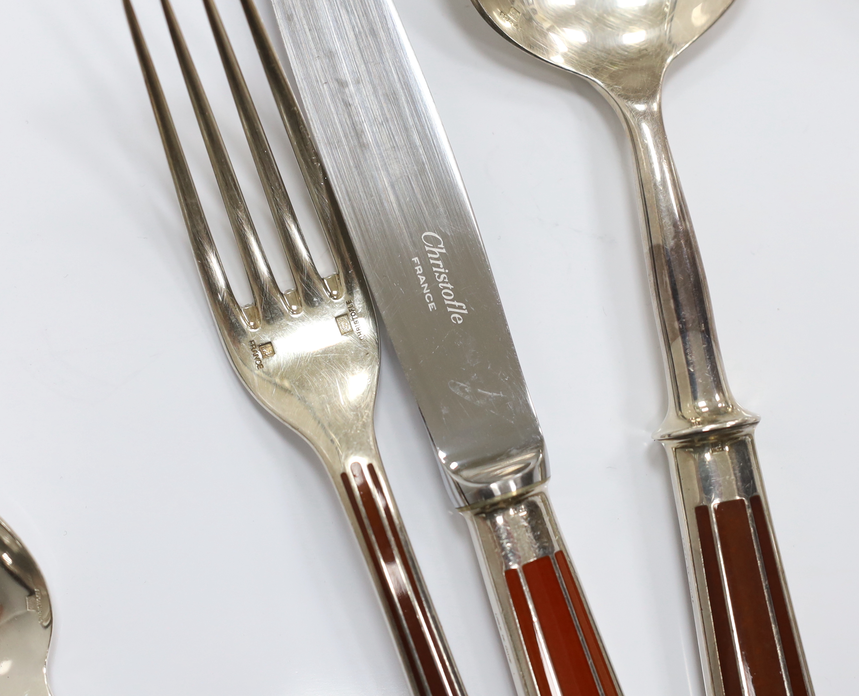 An almost complete canteen of modern Christofle silver plated and Chinese brown lacquer Talisman pattern cutlery for eight, designed by Bernard Yot